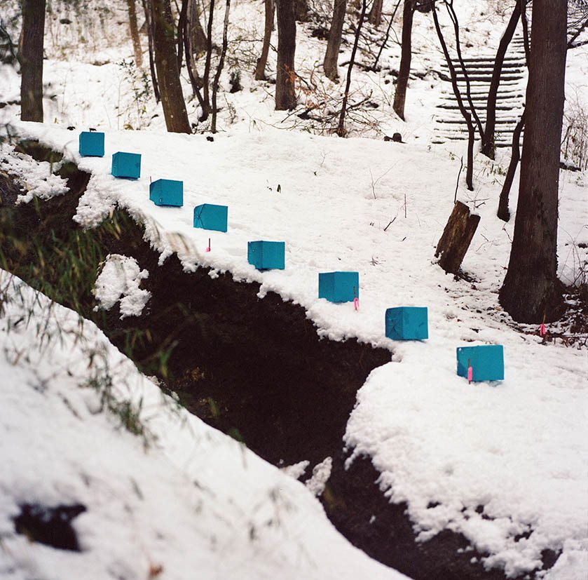 Marker line crossing a snow-covered ravine, Togatta